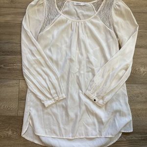 White tunic length blouse